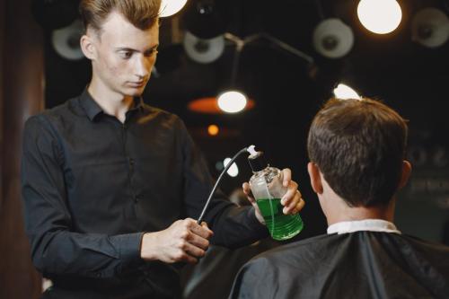 Stylish man sitting in a barbershop